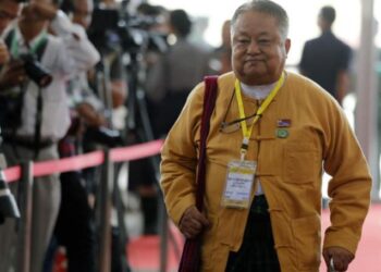 Myanmar junta sentences Win Htein to 20 years for treason